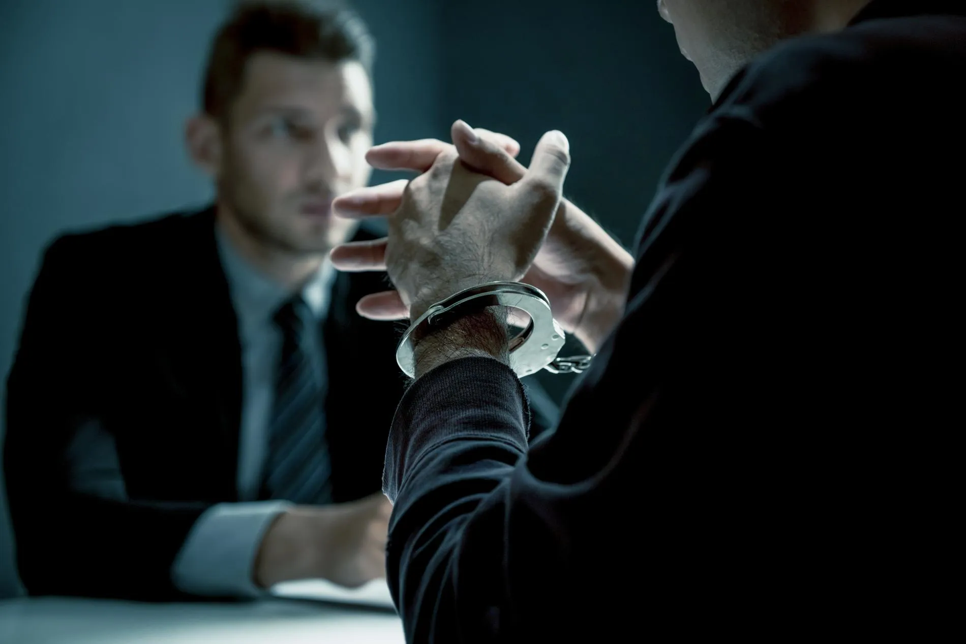 A man in an interrogation room