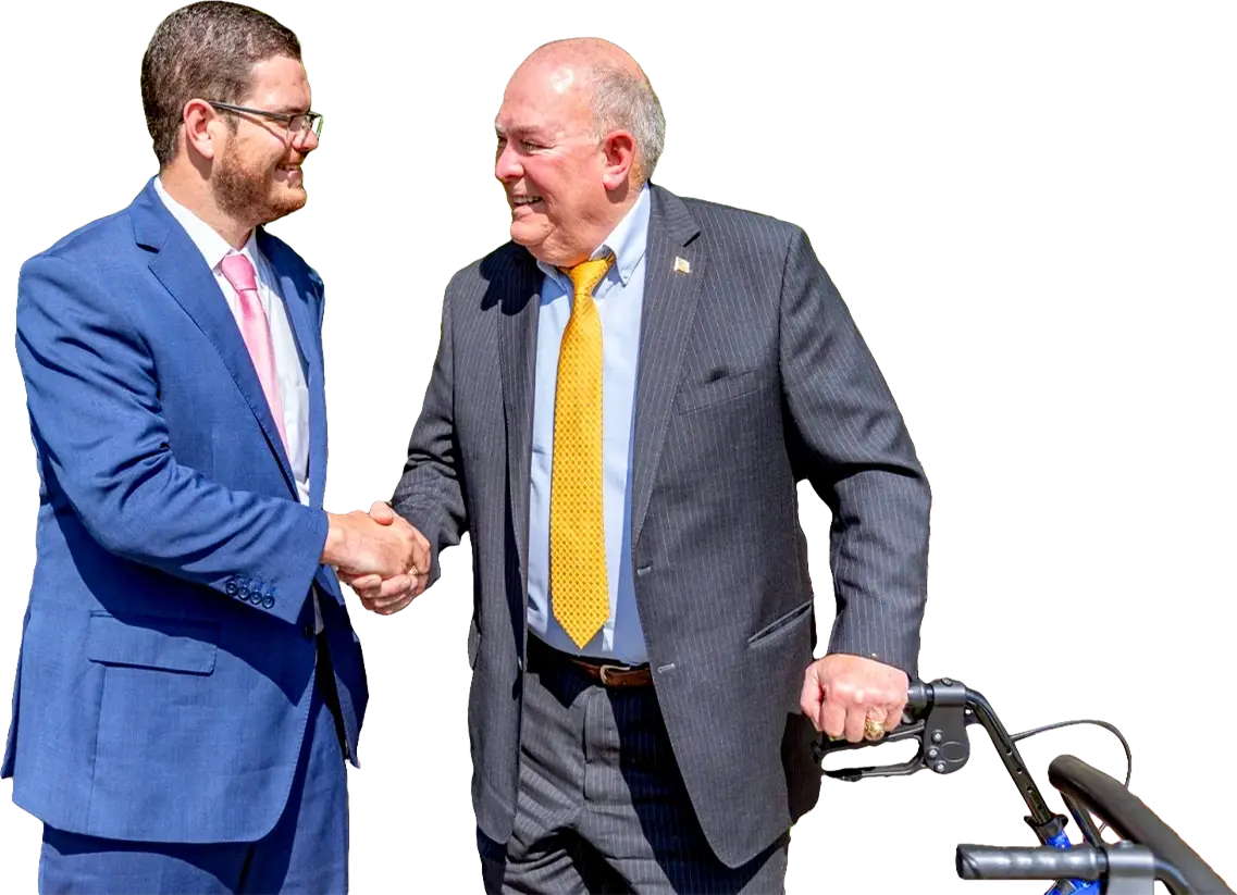 Young & Warr shaking hands