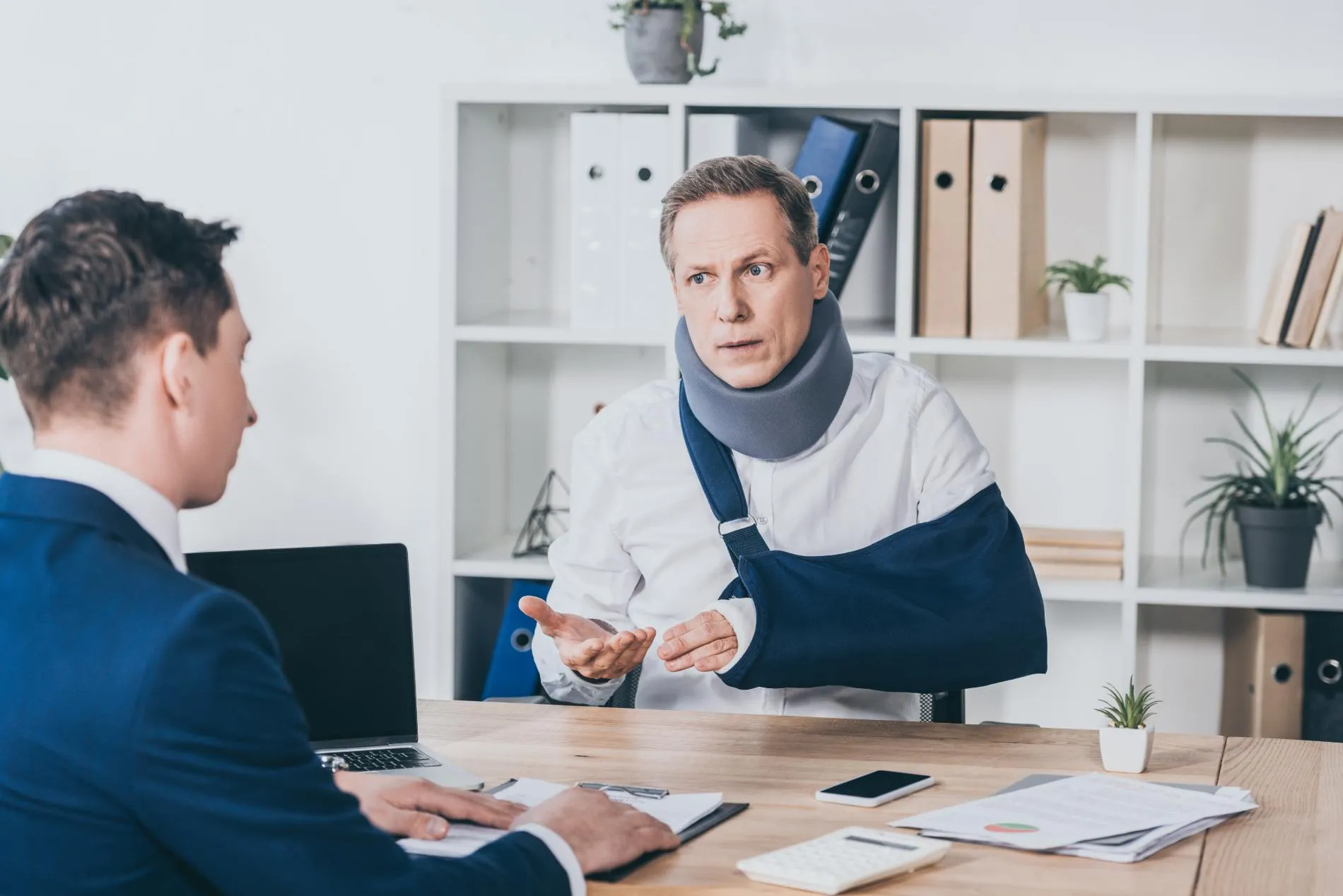A man speaking with a lawyer